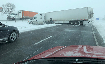 Photo of semi jack knifed on I-94.